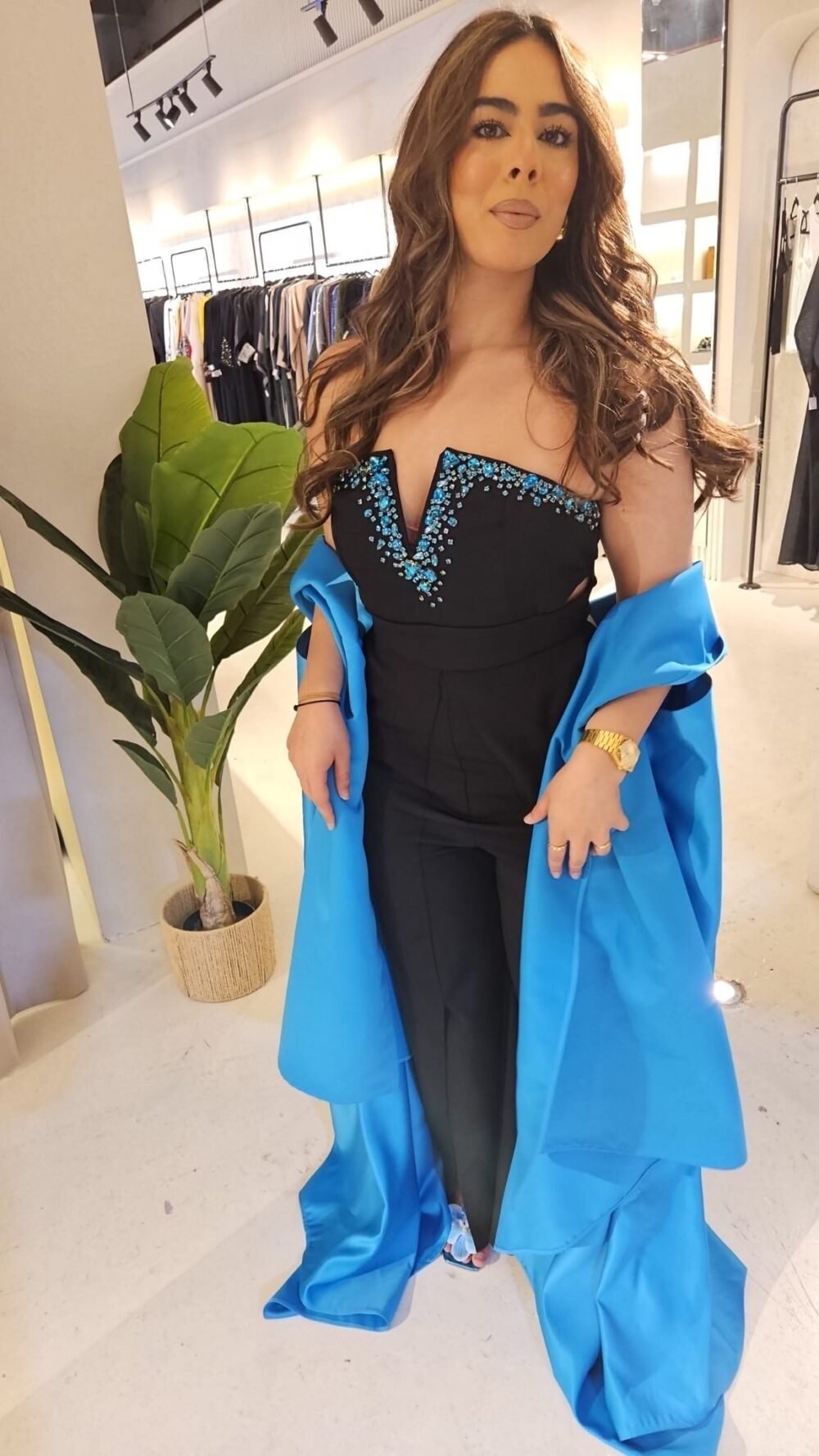 ⁦Blue jumpsuit⁩ - الصورة ⁦2⁩